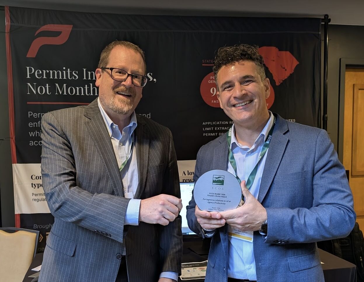 Rick Oppedisano and Matt Klein holding the ECOS People's Choice award